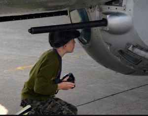 Youngster looking into the B-17 ball gun position.