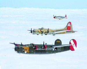 B-24 Liberator, B-17 Flying Fortress and P-51 Mustang in formation.