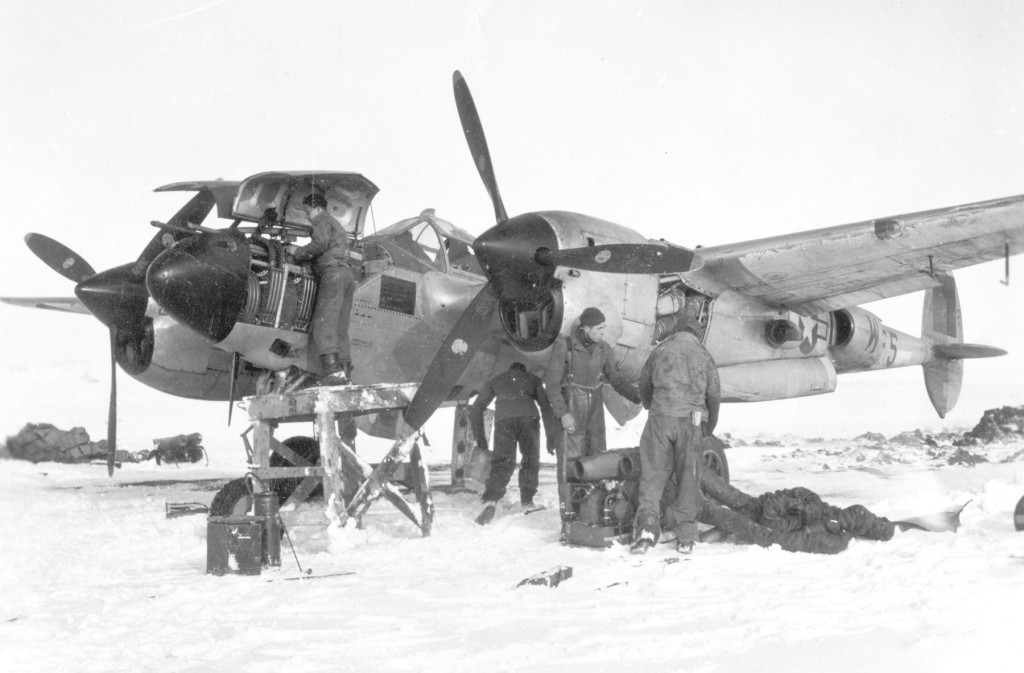 Feb 45, Belgium, work on guns, heater to warm up engine